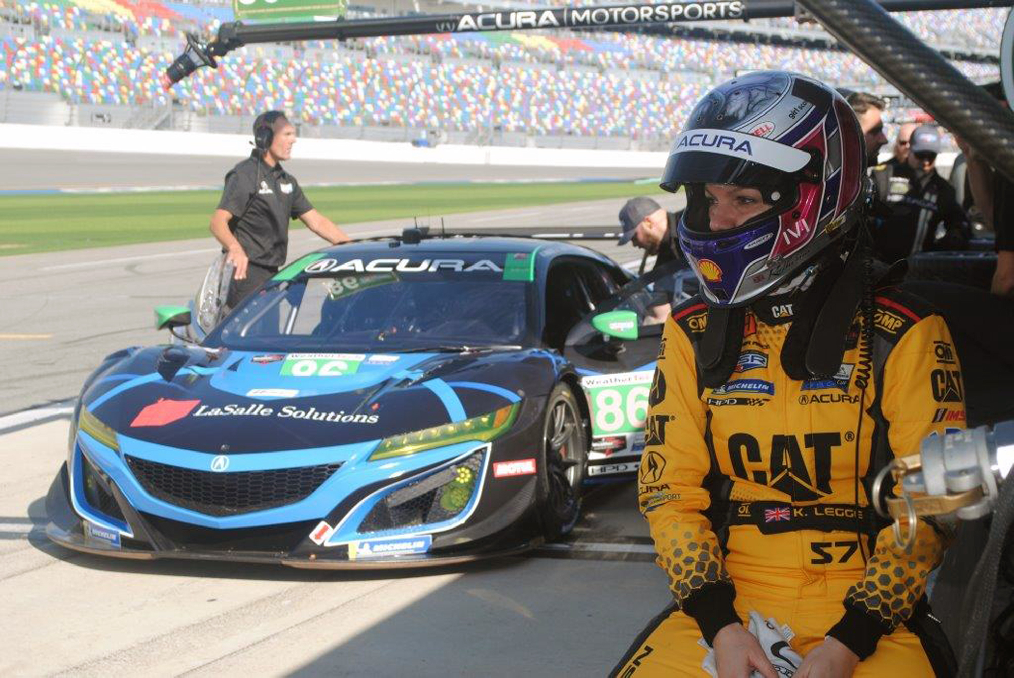 Female race car drivers carry hopes of female fans and athletes
